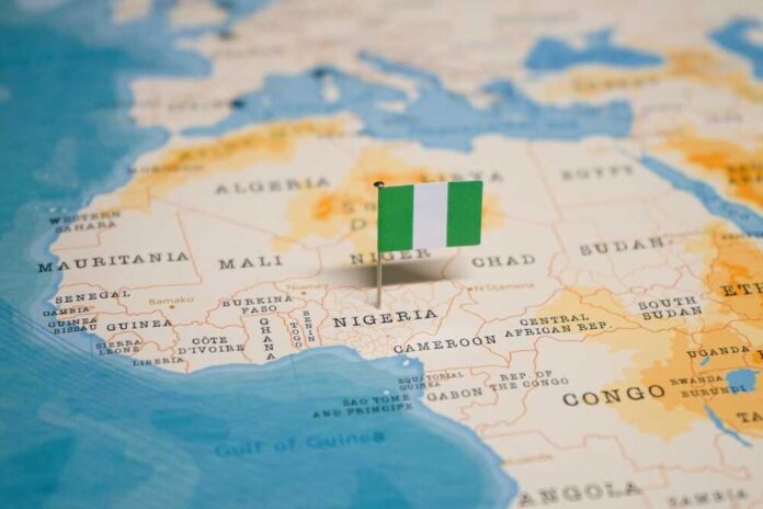 The,Flag,Of,Nigeria,On,The,World,Map.