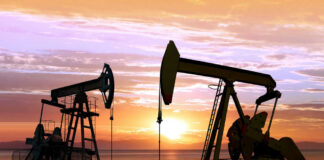 Oil pumps silhouetted against a sunset sky