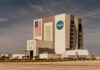 NASAs Vehicle Assembly Building with Artemis sign.