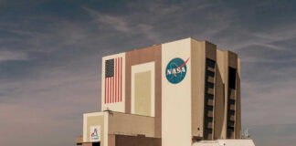 NASAs Vehicle Assembly Building with Artemis sign.