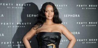 Celebrity posing at a Fenty Beauty event hosted by Sephora