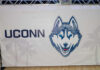UConn Husky logo displayed on a banner