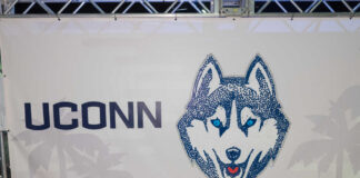 UConn Husky logo displayed on a banner