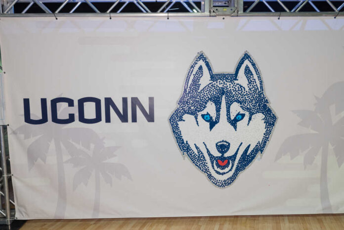 UConn Husky logo displayed on a banner