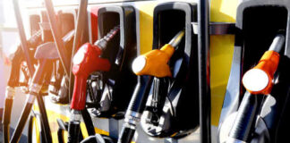 Close-up of multiple gas pumps at a fuel station