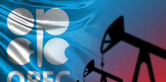 OPEC logo in front of an abstract flag background with oil rigs silhouettes