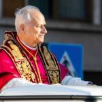 White House Defies Vatican—Pro-Life Clash Erupts! A religious leader in ceremonial attire smiling during a public appearance