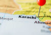 Close-up of a map showing Karachi with a red location pin