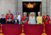Group of people on a balcony in formal attire