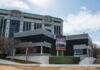 Modern building with a large banner displaying a historical quote