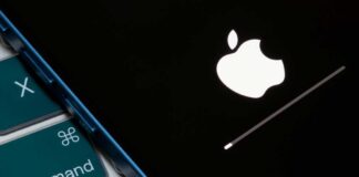 Apple logo displayed on a black screen with a loading bar