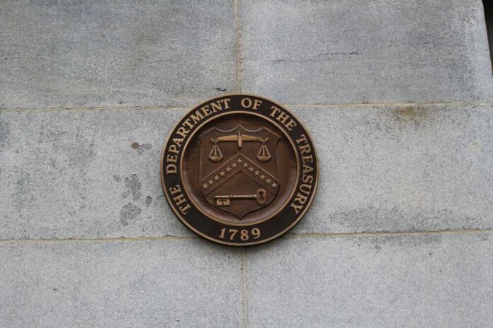 Bronze seal of the Department of the Treasury mounted on a stone wall