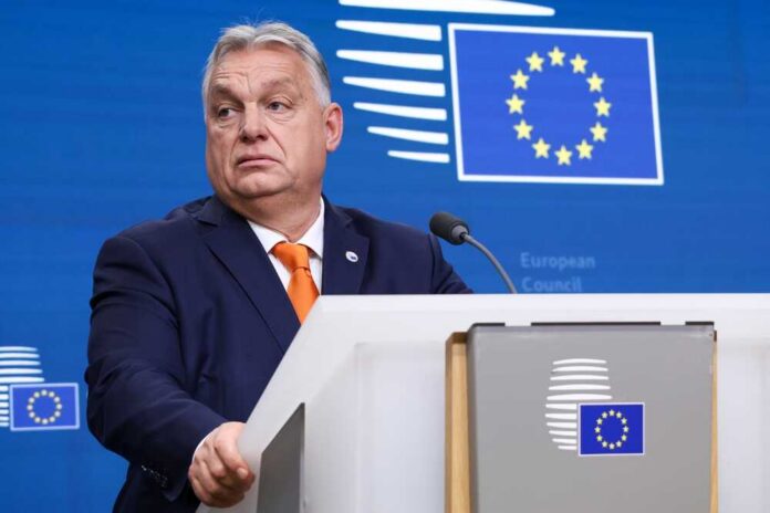 A government official at a podium during a press briefing