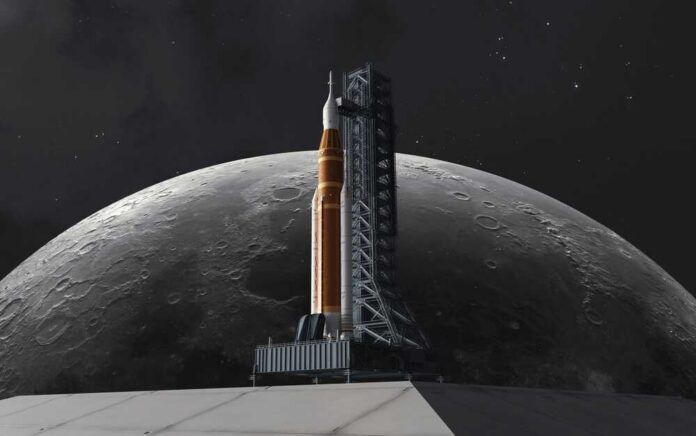 A rocket on a launch pad with the moon in the background