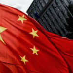 EU Supply Chains at Risk: China’s New Trade Tactic Close-up of the Chinese flag waving in the wind