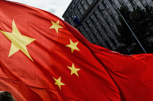 Close-up of the Chinese flag waving in the wind