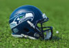 Seattle Seahawks football helmet on grass