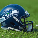 Seattle Seahawks football helmet on grass