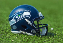 Seattle Seahawks football helmet on grass