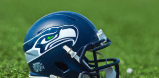 Seattle Seahawks football helmet on grass