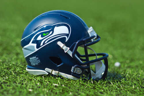 Seattle Seahawks football helmet on grass