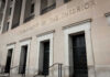 Department of the Interior building facade with tall stone entrances