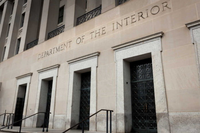 Us,Department,Of,The,Interior,,Washington,Dc,,Exterior Department of the Interior building facade with tall stone entrances