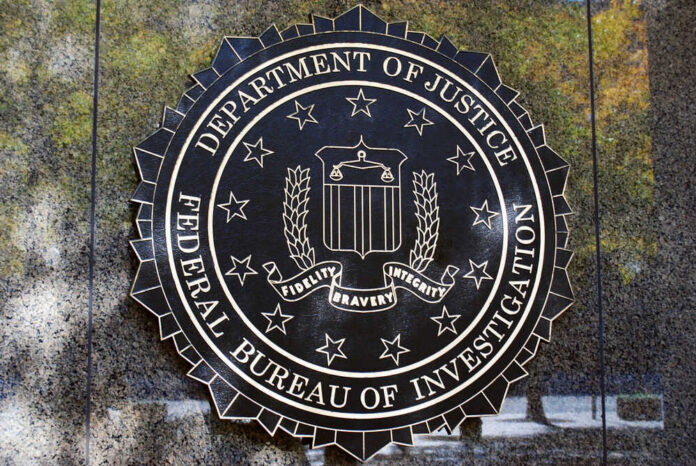FBI seal against marbled wall background.