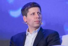 Person wearing a suit with a microphone headset