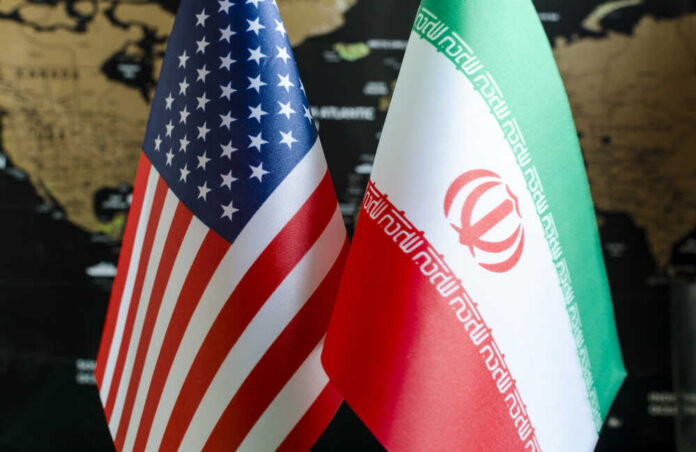 Fragments,Of,National,Flags,Of,Iran,And,The,United,States Flags of the United States and Iran displayed together