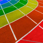 Colorful athletic track with curved lanes in various colors