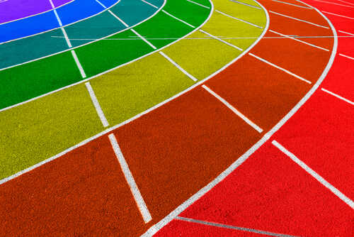 Colorful athletic track with curved lanes in various colors