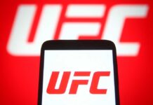 Smartphone displaying the UFC logo against a red background