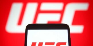 Smartphone displaying the UFC logo against a red background