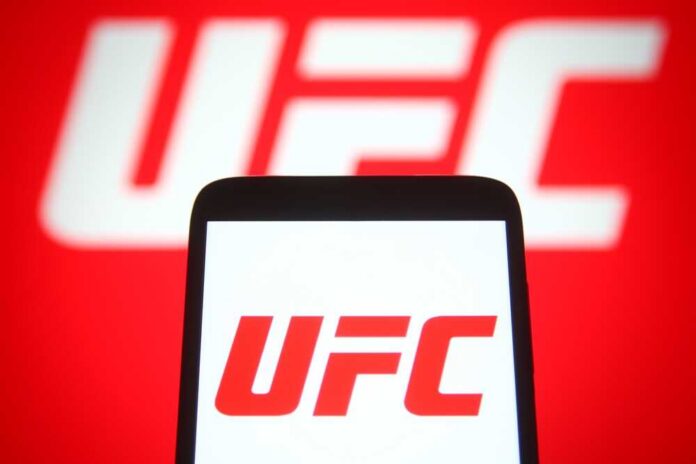 Smartphone displaying the UFC logo against a red background
