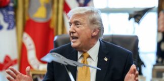 Donald Trump speaking animatedly in the Oval Office