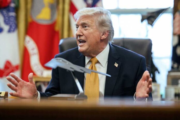 President,Donald,J.,Trump,Signs,An,Executive,Order,Creating,An Donald Trump speaking animatedly in the Oval Office
