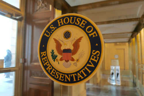 US House of Representatives seal on glass door