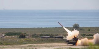 Surface-to-air missile launching from a coastal battery
