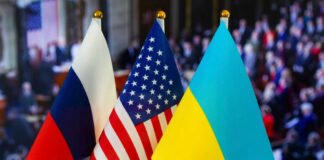 Russian, American, and Ukrainian flags side by side