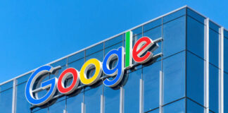 Google logo on glass office building facade