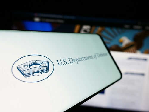 U.S. Department of Defense logo on a screen.