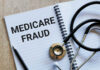 Notebook stethoscope and pen with Medicare Fraud text