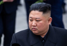 A Costly Mistake With Bigger Consequences A political figure in formal attire with a serious expression