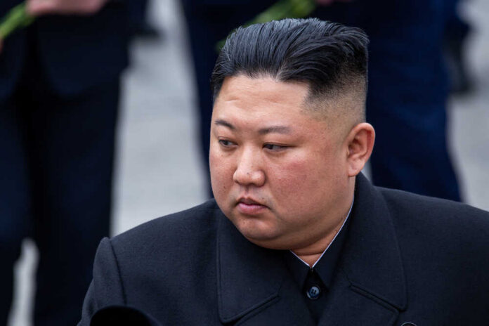 April,26,,2019,-,Vladivostok,,Primorsky,Krai,-,North,Korean A political figure in formal attire with a serious expression