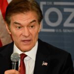 White House Showdown: Health, Fraud, Fallout A man speaking into a microphone with an American flag pin on his suit