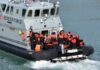 Open Borders OVER—Fast-Track Deportations Border Force boat with migrants wearing life jackets