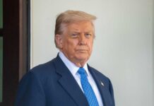 The Middle East Bet Everyone Is Watching A political figure standing outdoors with a serious expression