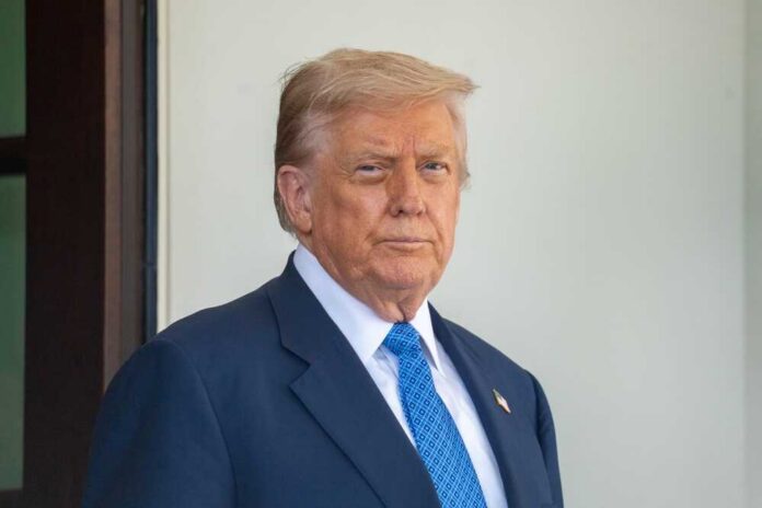 Washington,Dc,,United,States,,August,9,2025:,President,Trump,Welcomes A political figure standing outdoors with a serious expression