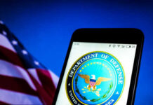 Stunning Cut: 180 Beliefs Erased By Pentagon Department of Defense logo on smartphone screen flag